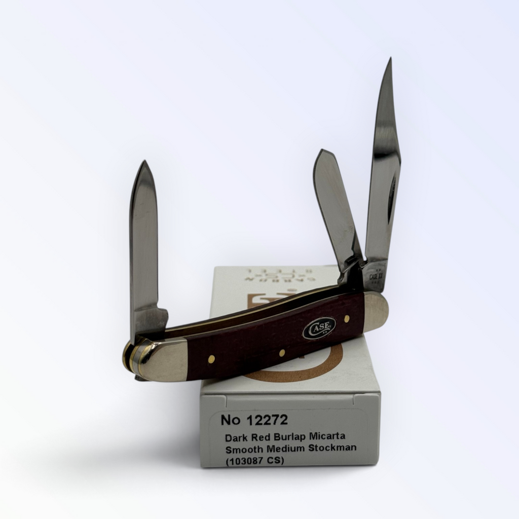 Medium Stockman by Case XX in dark red burlap Micarta (12272), three-quarter open shot showing handle and blades