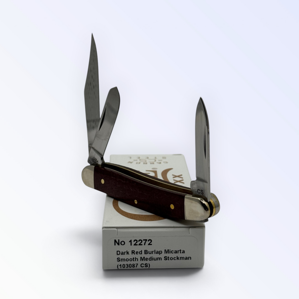 Case XX Medium Stockman 12272: dark red burlap Micarta, open on box with end label facing forward
