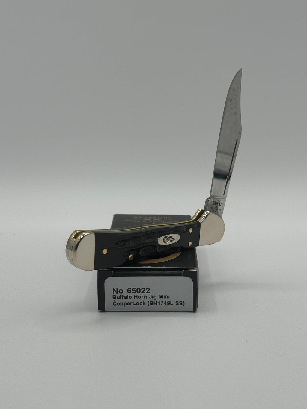 Pigeon Roost Knives Case XX Mini CopperLock pocket knife with black jigged buffalo horn handle and locking clip blade