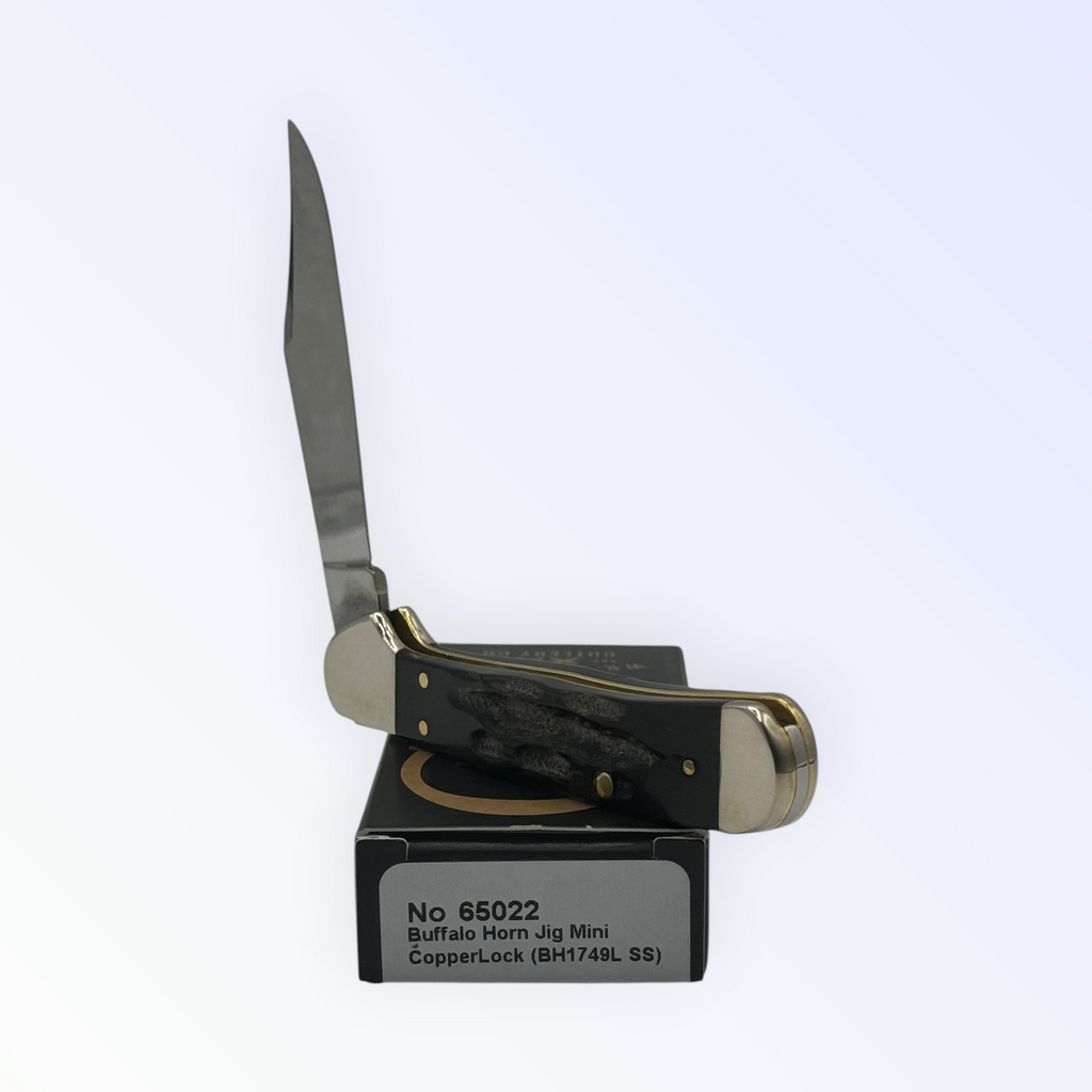 Pigeon Roost Knives Case XX Mini CopperLock pocket knife with jigged buffalo horn handle and locking clip blade.