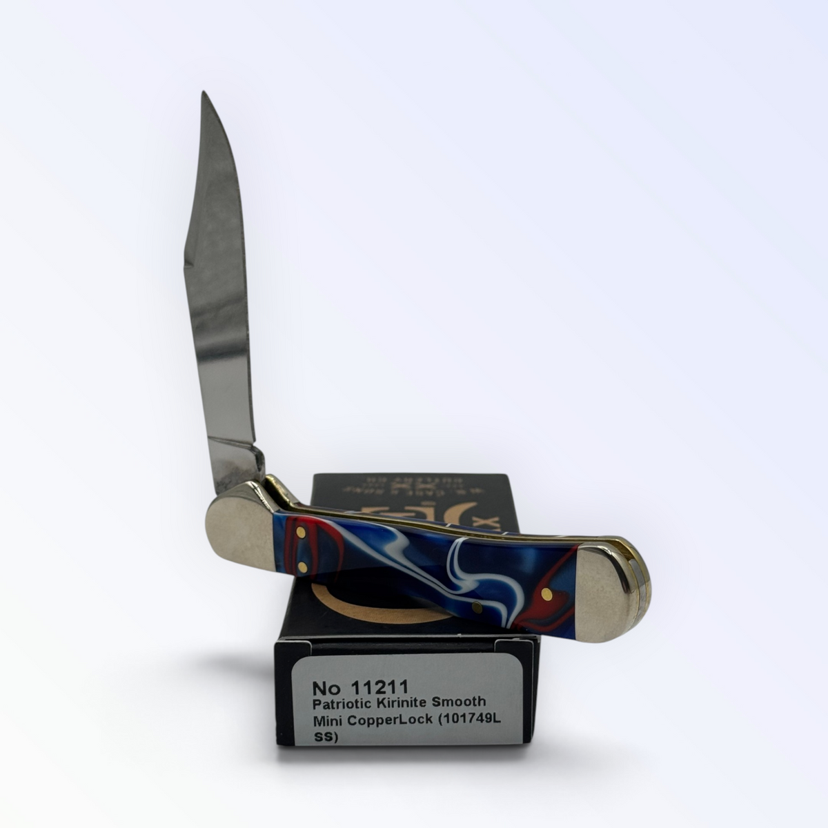 Case XX Mini CopperLock 11211: Patriot Kirinite, open on box with end label facing forward