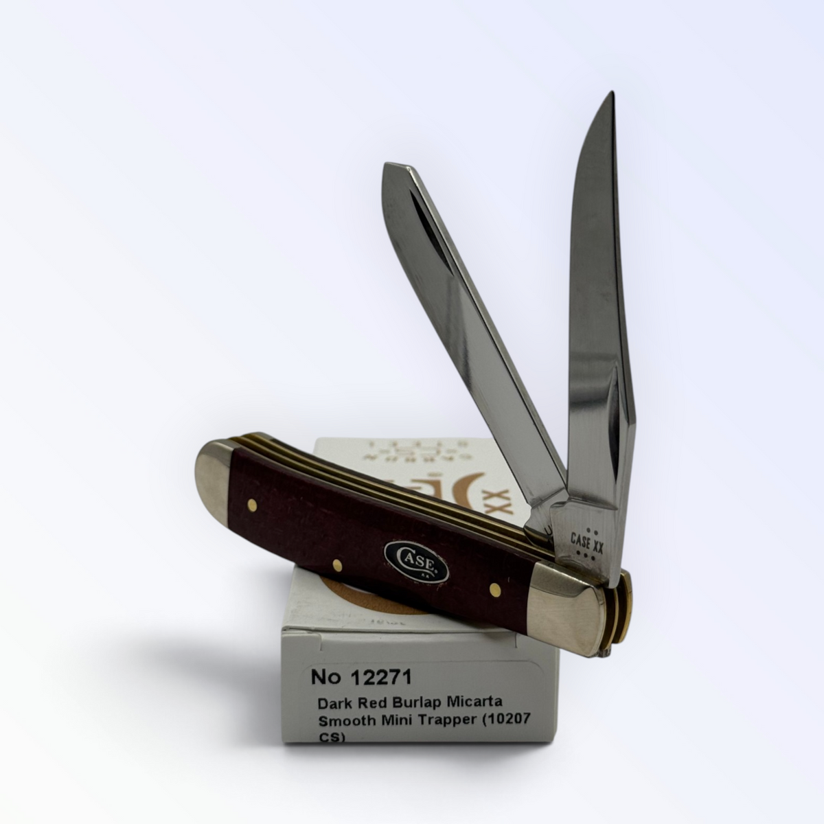 Case XX 12271 Mini Trapper in dark red burlap Micarta — angled open view on Case XX packaging