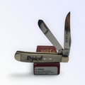 Case XX Mini Trapper with Religious Natural Bone (Psalms 118:24), SKU 60865 — closed profile on the Case XX box