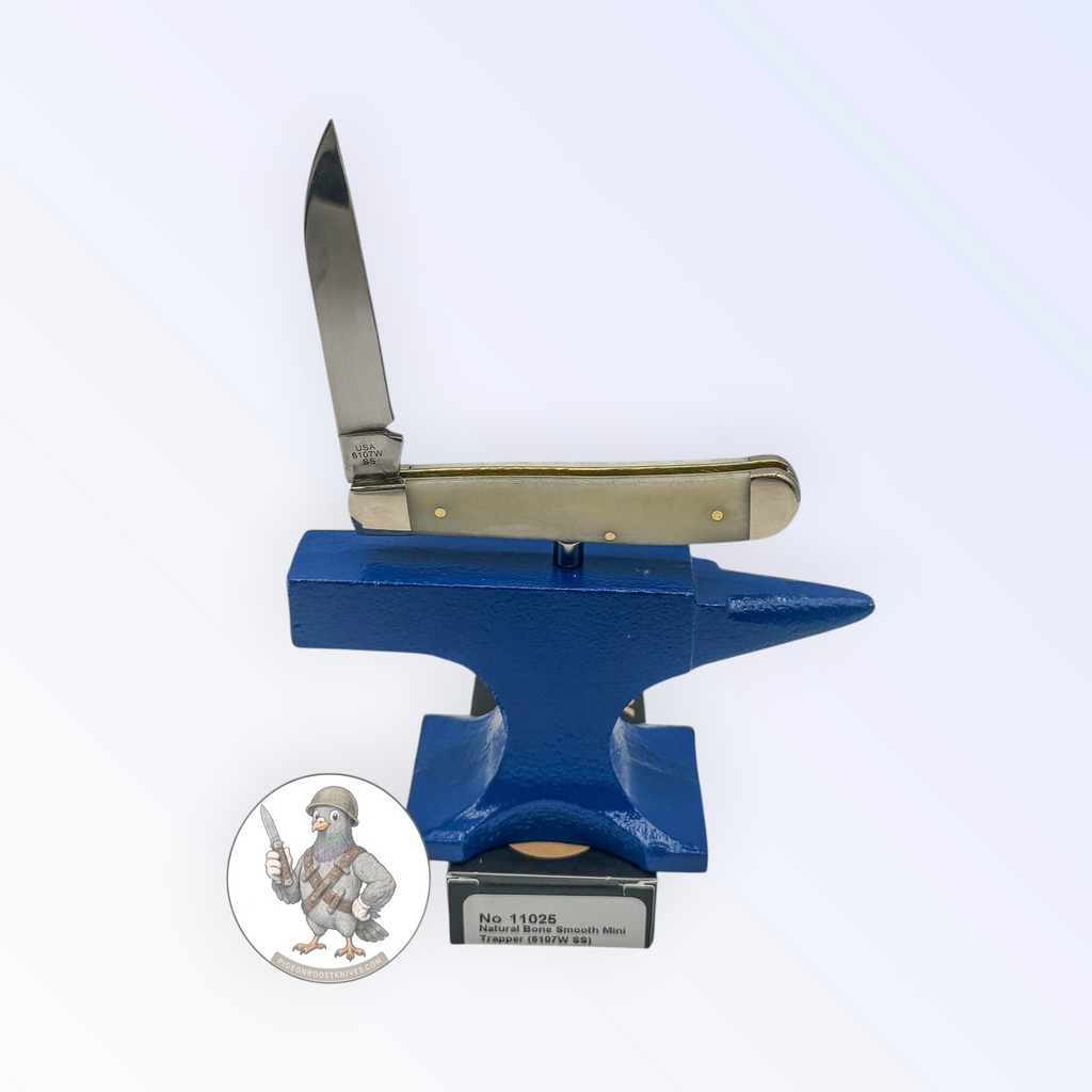 Case XX 11025 Mini Trapper in smooth natural bone — angled open view on Case XX packaging