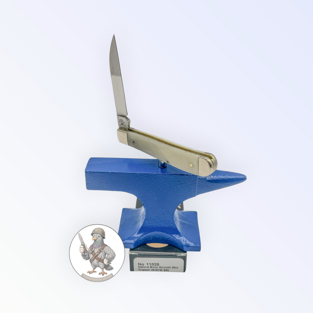 Mini Trapper by Case XX in smooth natural bone (11025), three-quarter open shot of handle and blades