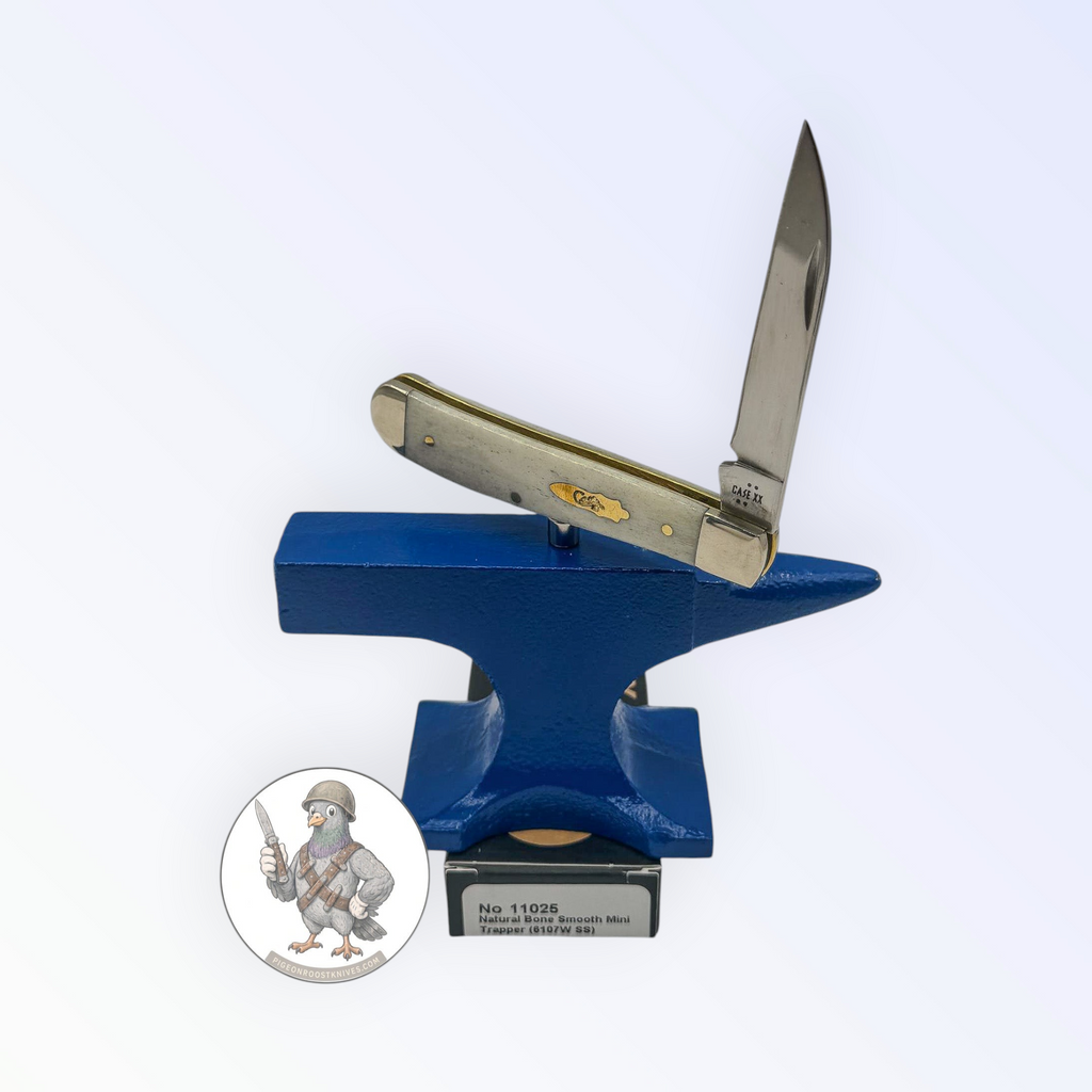 Case XX Mini Trapper 11025: smooth natural bone, open on box with label visible