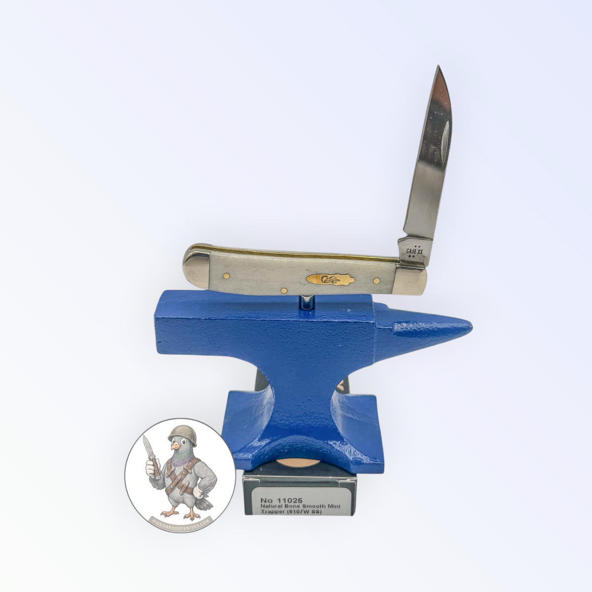 Catalog 11025 Case XX Mini Trapper — smooth natural bone, studio shot open atop the retail box