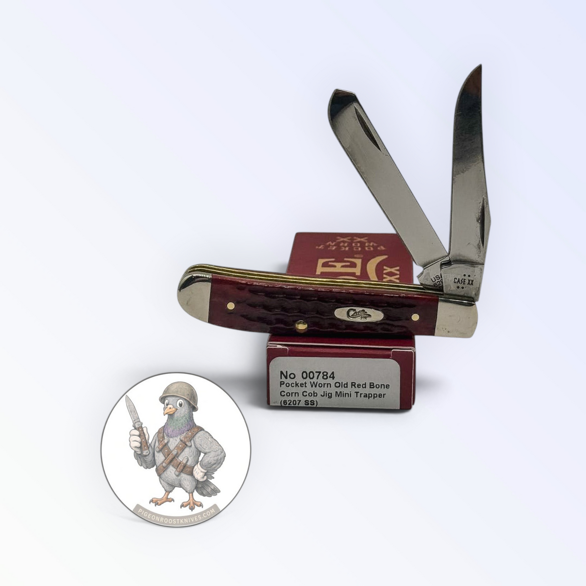 Mini Trapper by Case XX featuring Jigged Old Red Bone Pocket Worn (00784), pocket-knife studio shot on retail box
