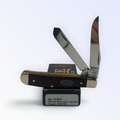 Catalog 51541 Case XX Mini Trapper — Red Bone Gator Jig, knife displayed atop the Case box