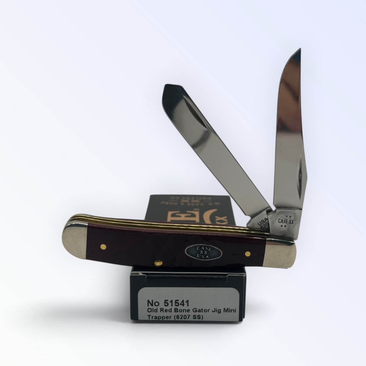 Catalog 51541 Case XX Mini Trapper — Red Bone Gator Jig, knife displayed atop the Case box