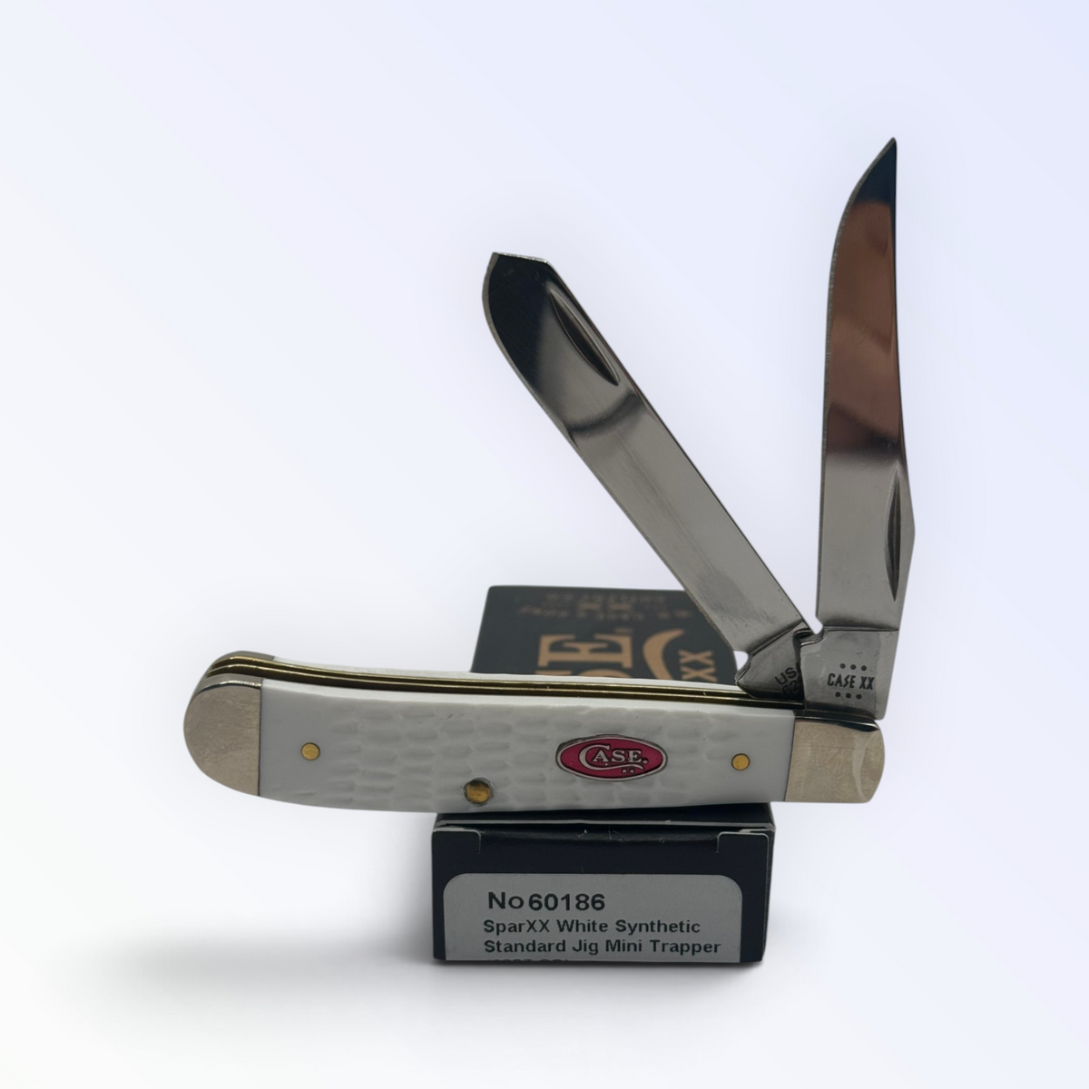 Mini Trapper from Case XX in SparXX White Synthetic, SKU 60186 — three-quarter view on Case packaging