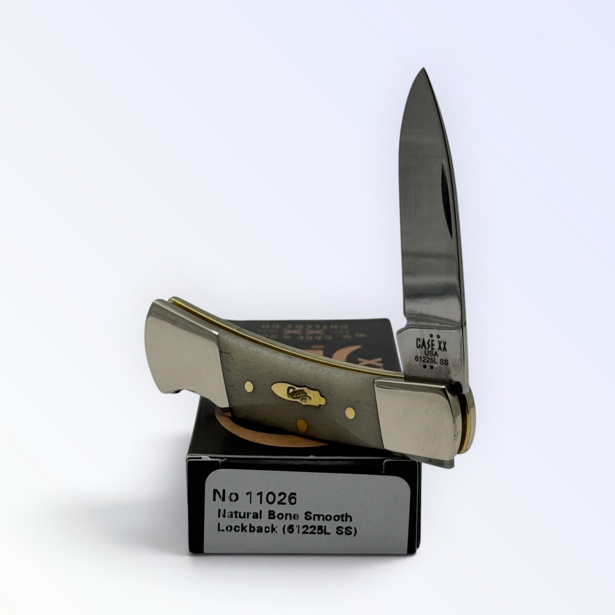Pigeon Roost Knives Case XX lockback pocket knife with smooth natural bone handle and stainless steel drop-point blade.