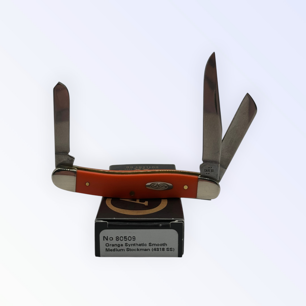 Pigeon Roost Knives Case XX Medium Stockman pocket knife with smooth orange synthetic handle and three steel blades.