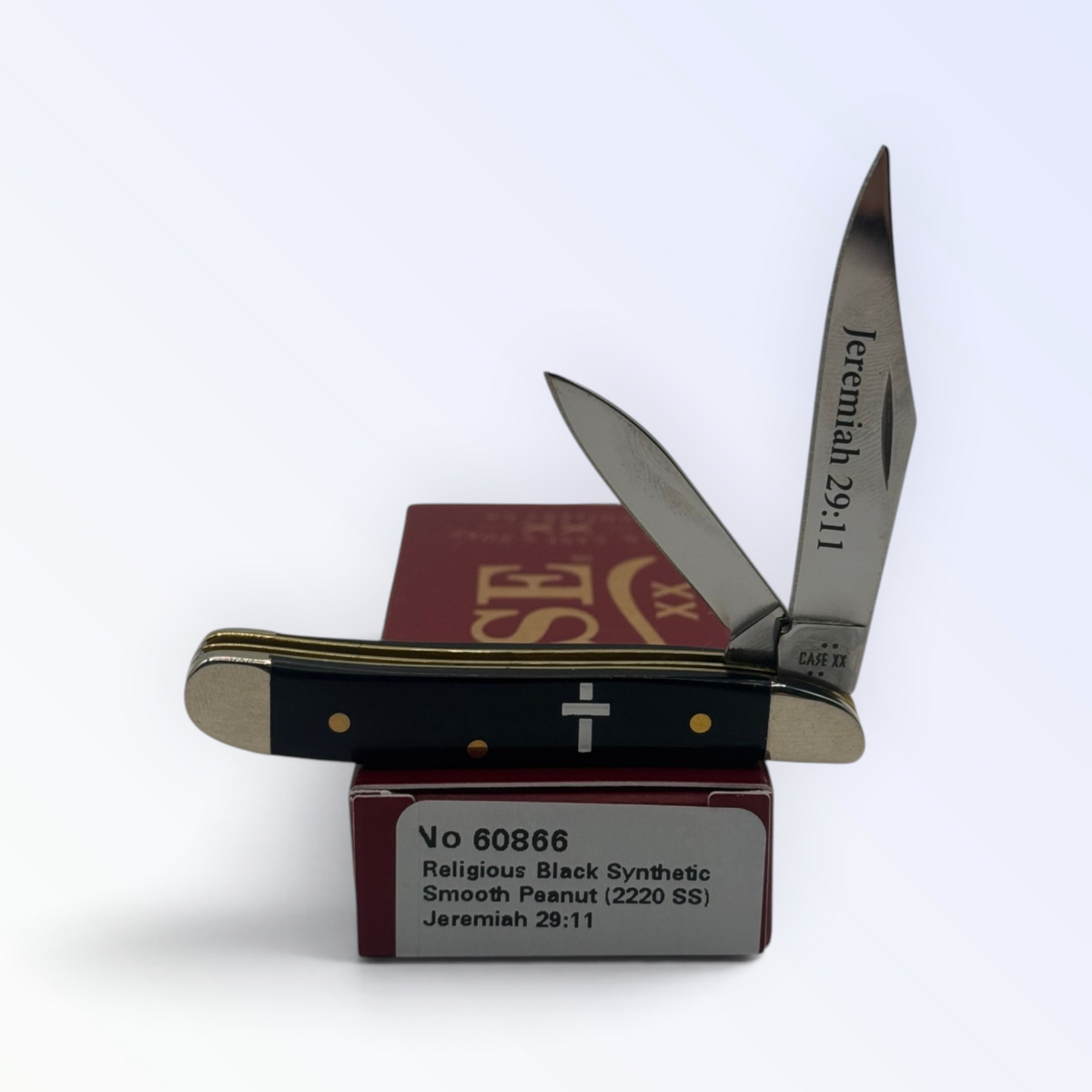 Case XX 60866 Peanut in Religious Black Synthetic (Jeremiah 29:11) — open blades resting on factory packaging