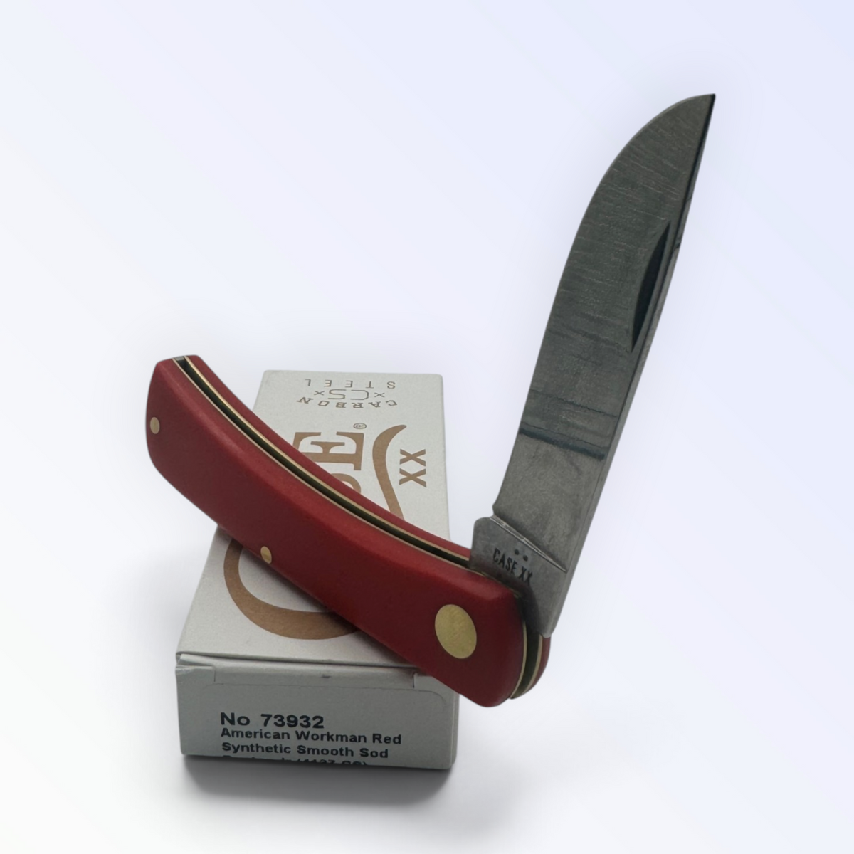 Pigeon Roost Knives Case XX American Workman Sod Buster Jr pocket knife with a red synthetic handle and carbon blade