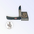 Case XX Rogers Jig Navy Blue Bone Sod Buster Jr with SKU 06890 — blades open resting on the factory box