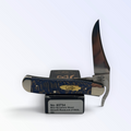 Case XX Russlock Smooth Blue Sycamore Wood with SKU 63734 — blades open resting on the factory box