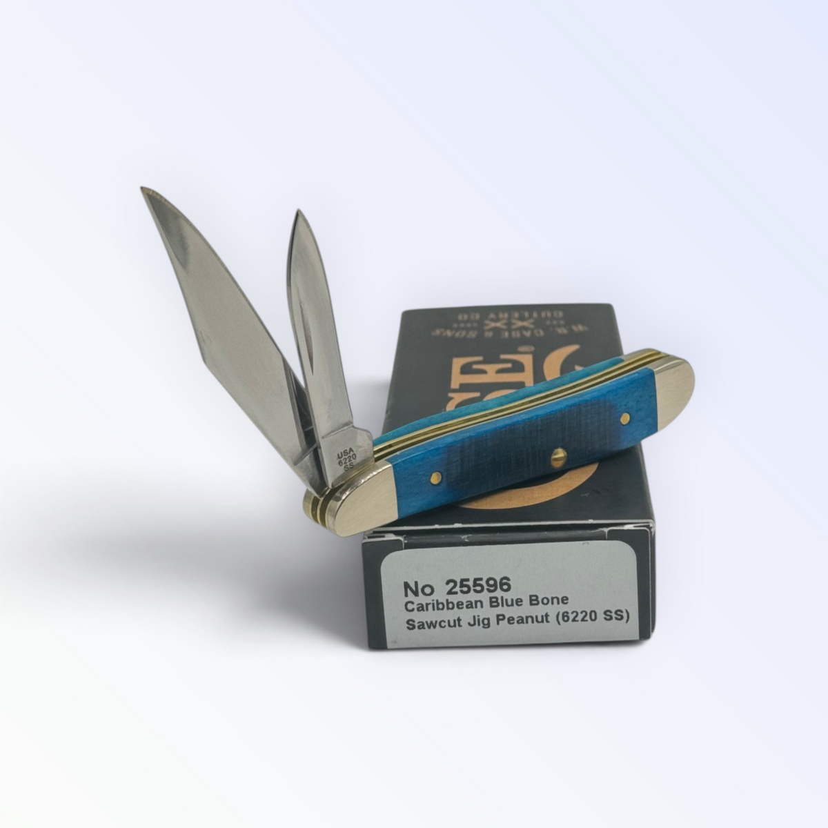 Case XX Sawcut Caribbean Blue Bone Peanut (25596) — pocket-knife studio shot on retail box