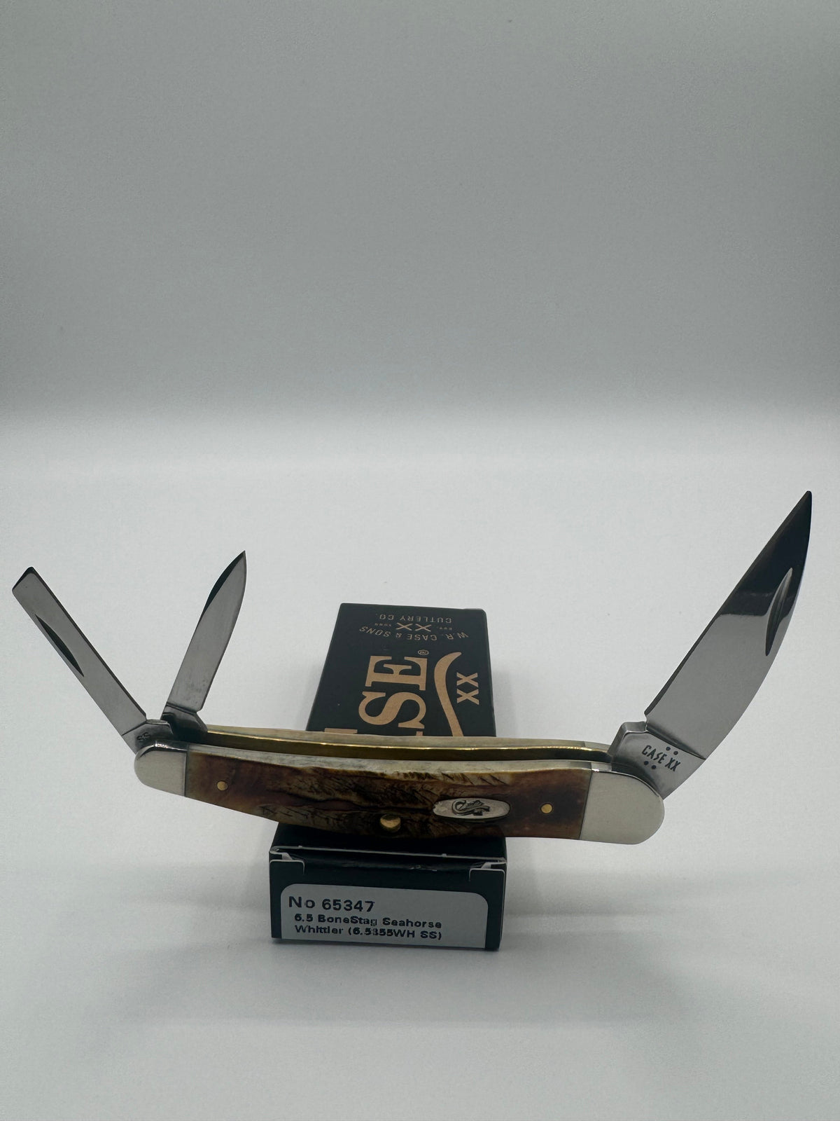Pigeon Roost Knives Case XX 65347 Seahorse Whittler pocket knife with 6.5 BoneStag handle and three stainless blades.