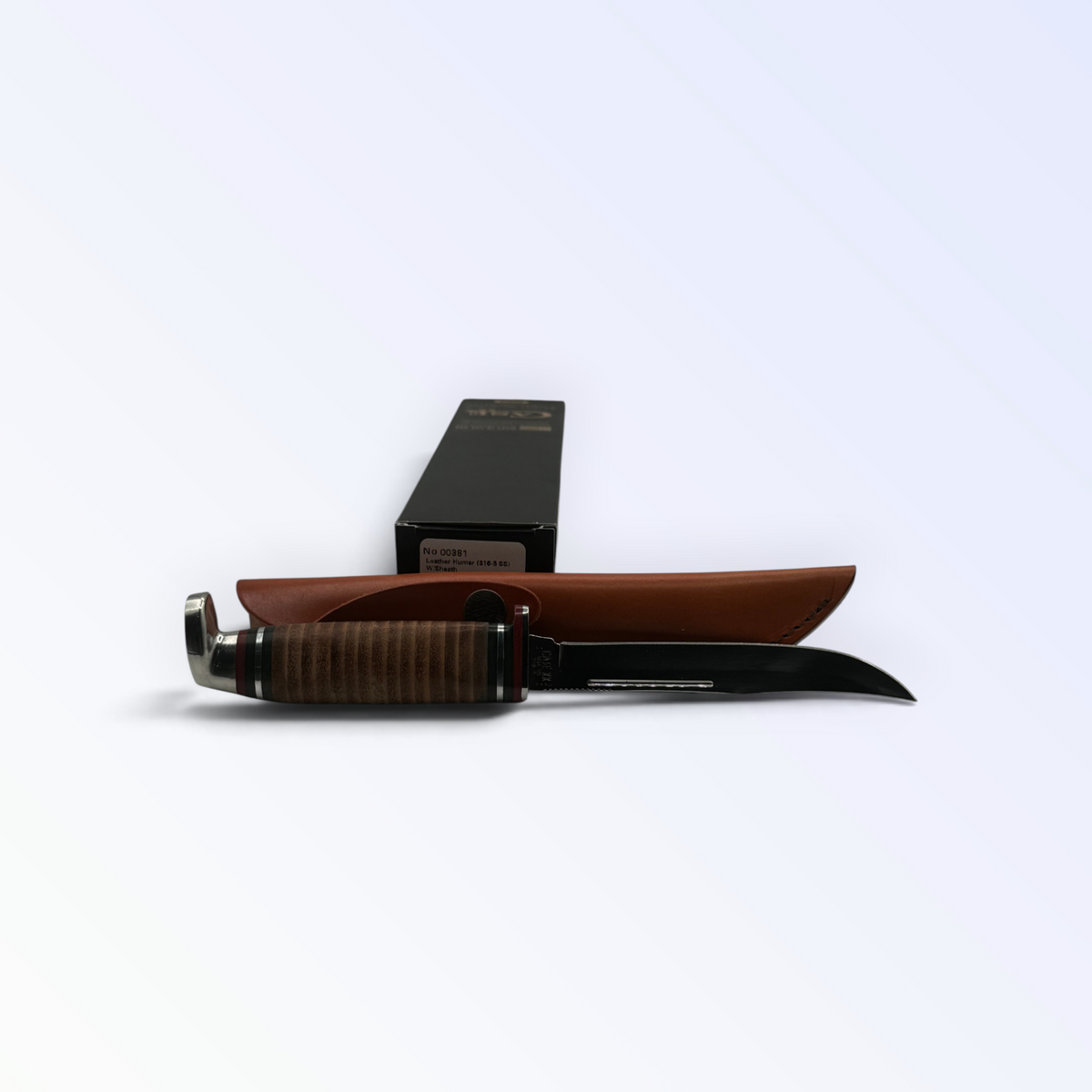 Pigeon Roost Knives Case XX Slim Fixed Blade Hunter with polished stacked leather handle and brown leather sheath.