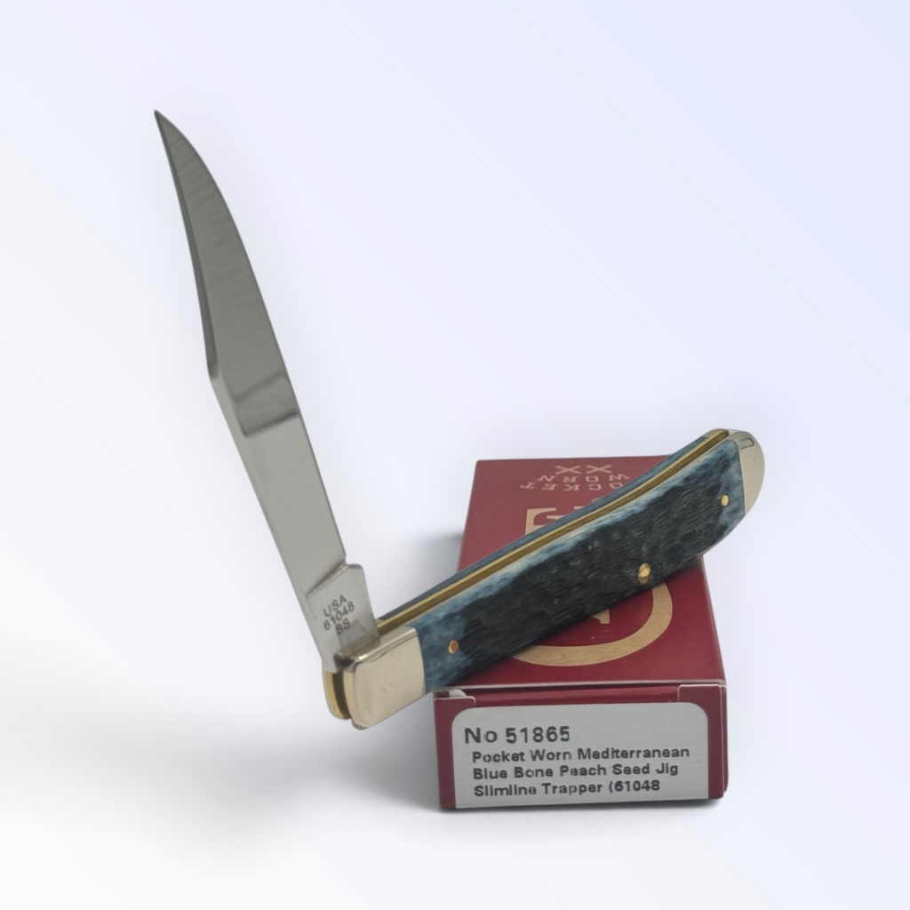 Case XX Slimline Trapper Peach Seed Mediterranean Blue Bone (51865) — pocket-knife studio shot on retail box
