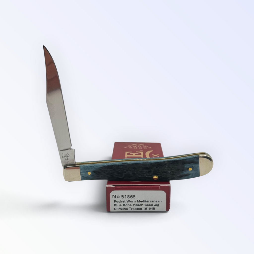Slimline Trapper Peach Seed Mediterranean Blue Bone by Case XX (51865), close view of handle texture with blades open on box