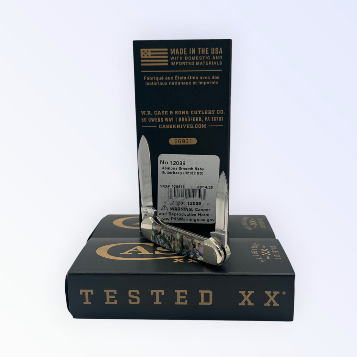 Catalog 12039 Case XX Smooth Abalone Butterbean — open blades resting on factory packaging