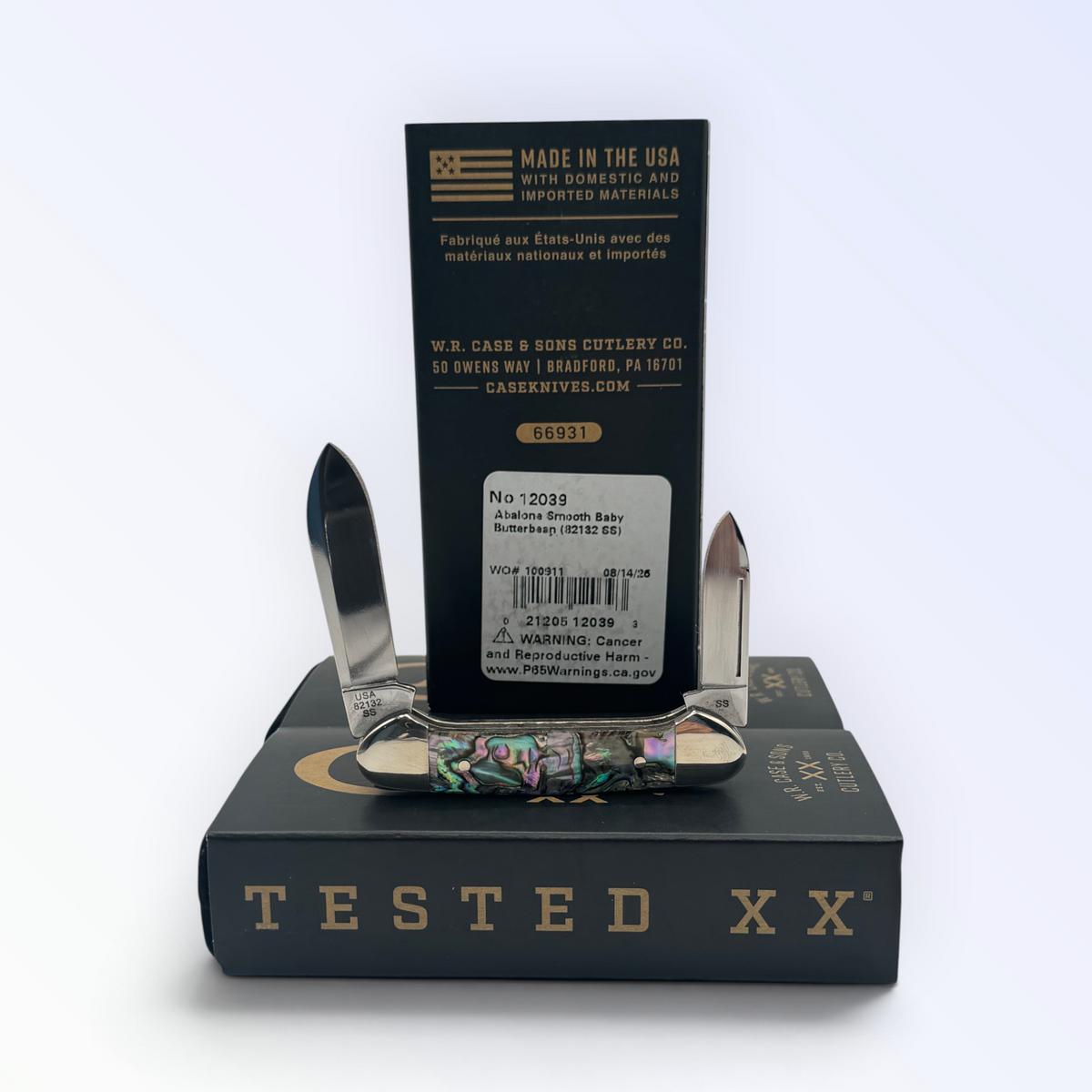 Smooth Abalone Butterbean by Case XX (12039), close view of handle texture with blades open on box