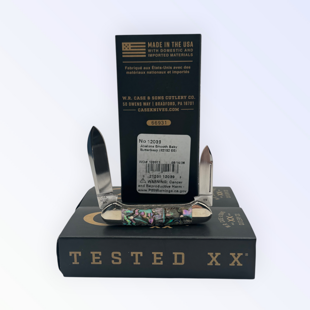 Smooth Abalone Butterbean by Case XX (12039), close view of handle texture with blades open on box