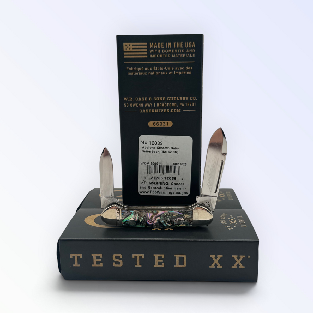Case XX Smooth Abalone Butterbean with SKU 12039 — blades open resting on the factory box