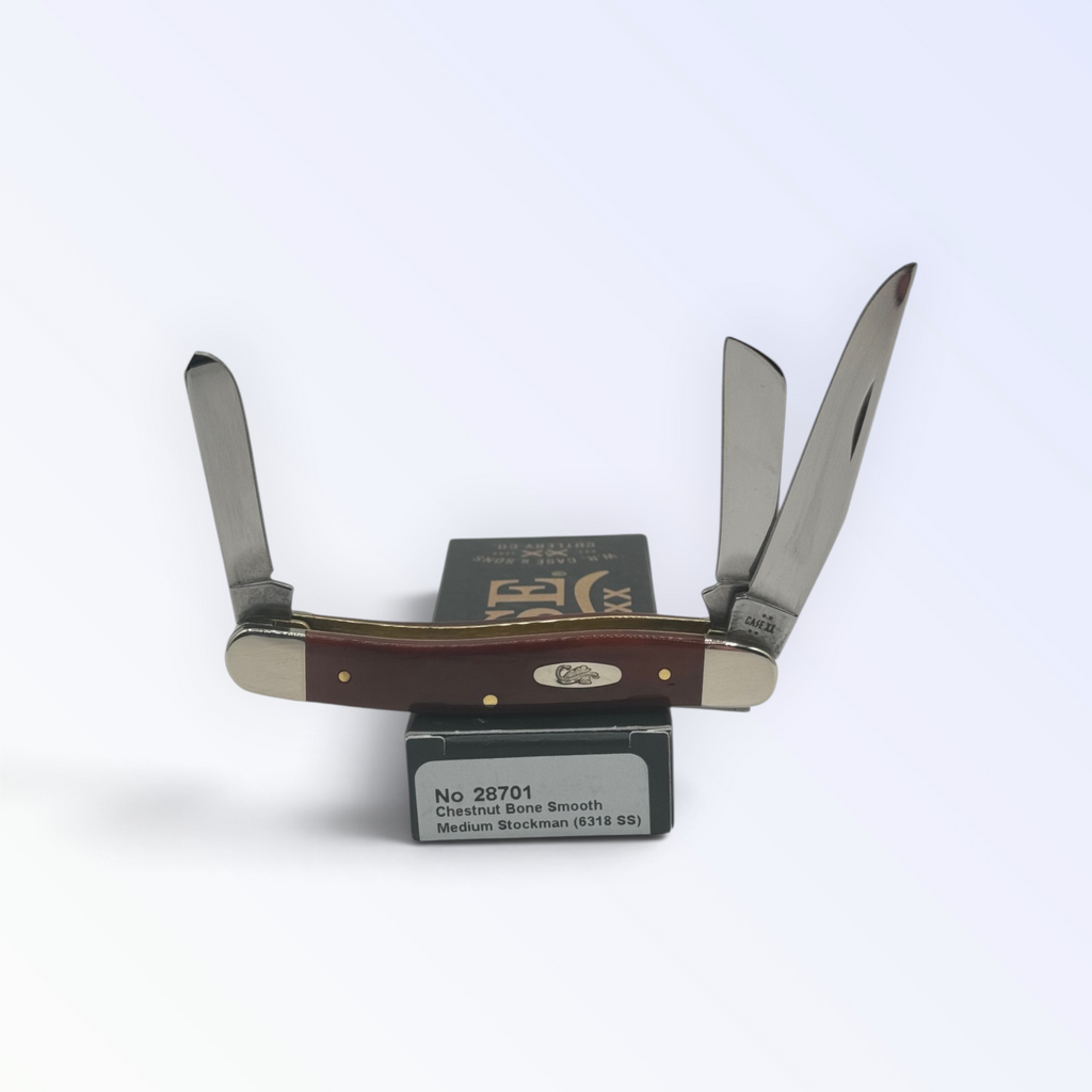 Case XX Smooth Chestnut Bone Medium Stockman with SKU 28701 — blades open resting on the factory box