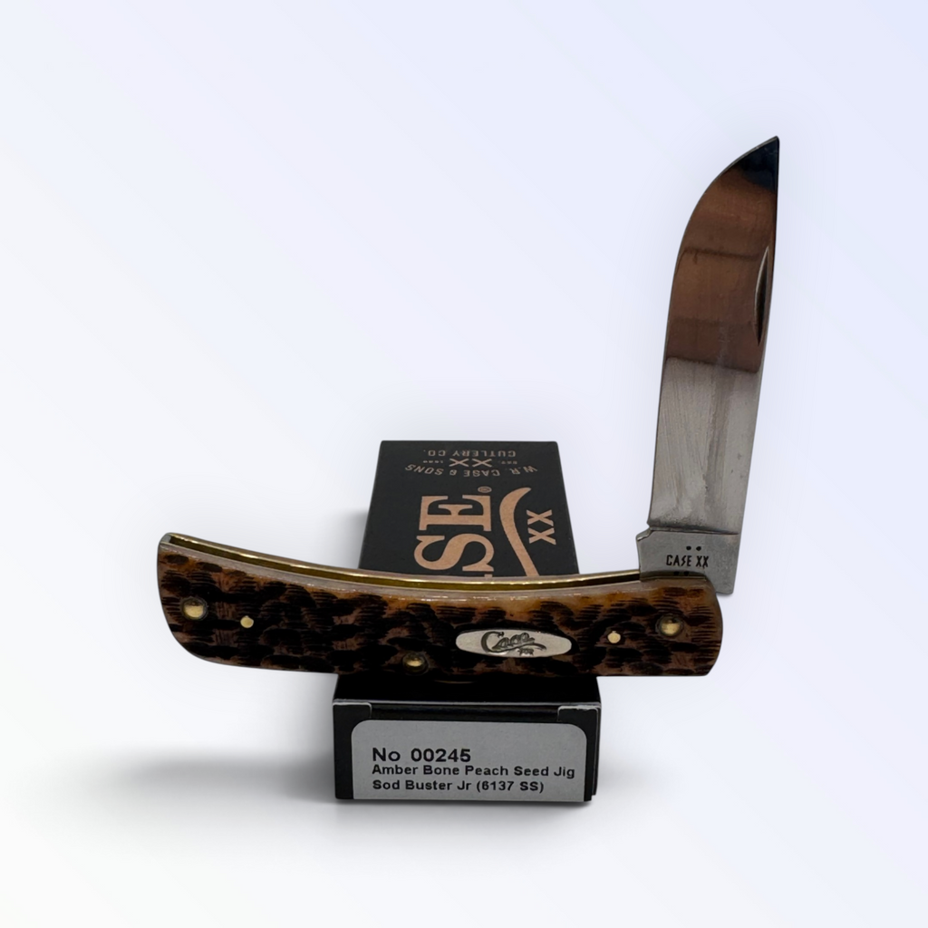 Pigeon Roost Knives Case XX Sod Buster Jr. pocket knife with amber bone peach seed jig handle and stainless steel blade 00245