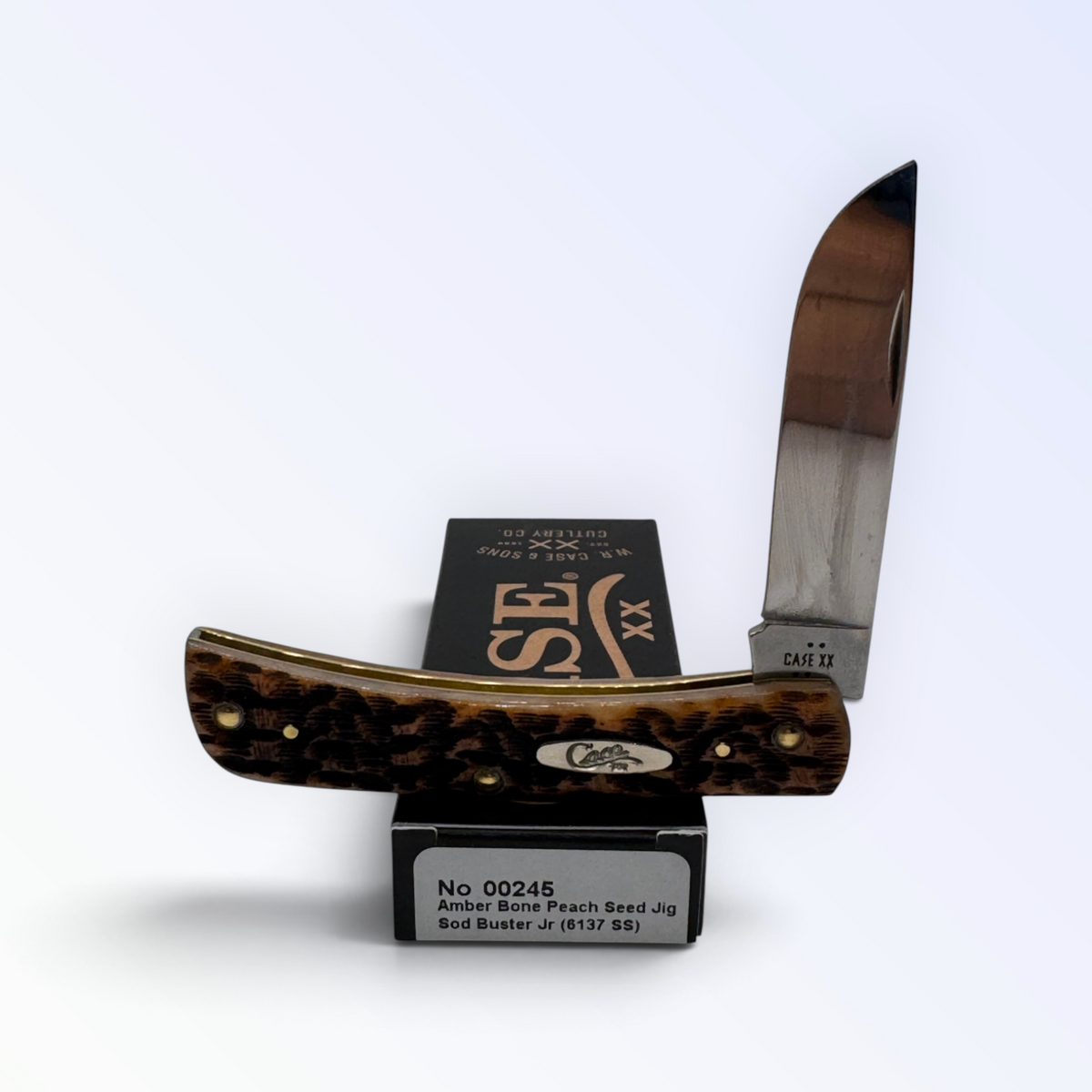 Pigeon Roost Knives Case XX Sod Buster Jr. pocket knife with amber bone peach seed jig handle and stainless steel blade 00245
