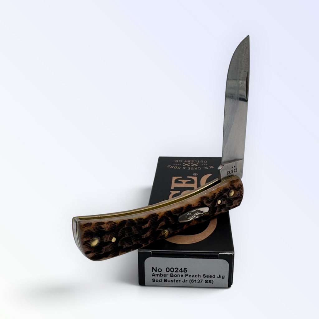 Pigeon Roost Knives Case XX Sod Buster Jr. pocket knife with amber bone peach seed jig handle and stainless steel blade