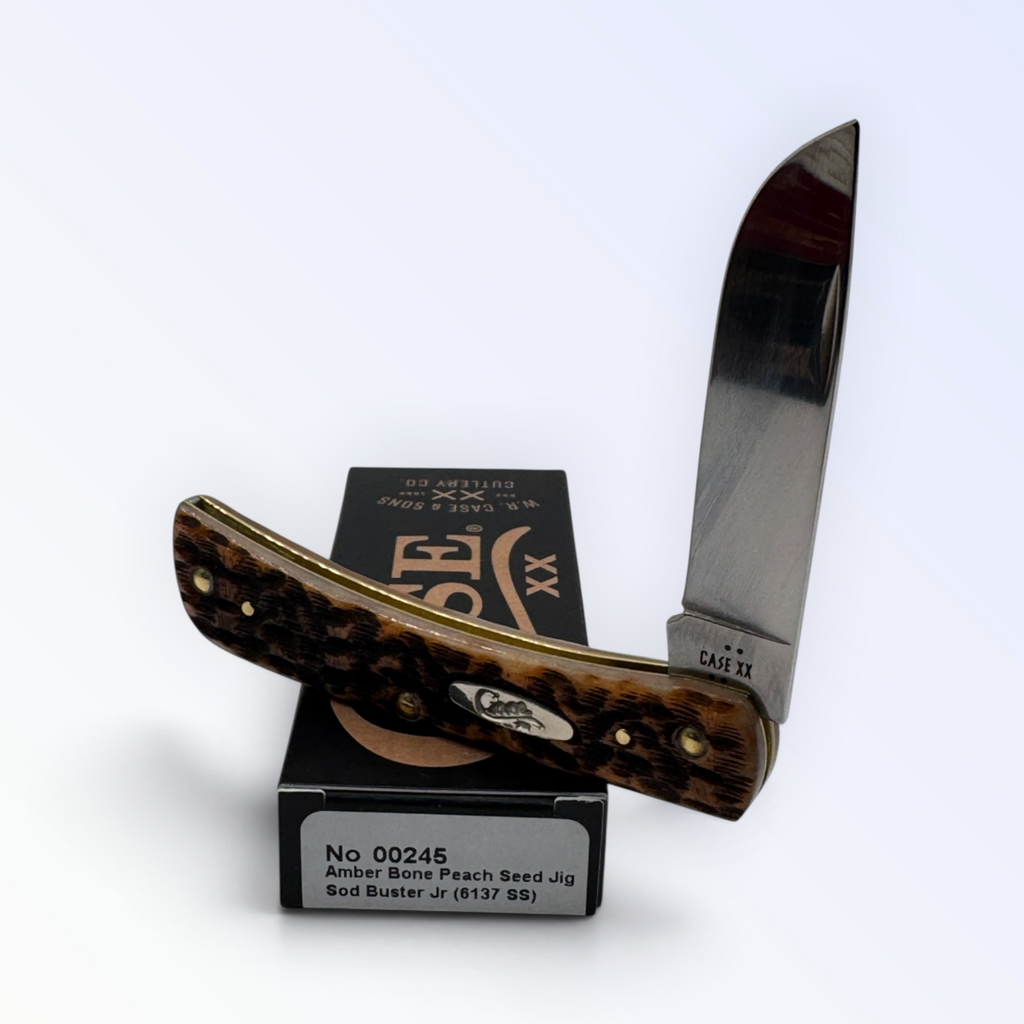 Pigeon Roost Knives Case XX Sod Buster Jr. pocket knife with amber bone peach seed jig handle and stainless steel blade