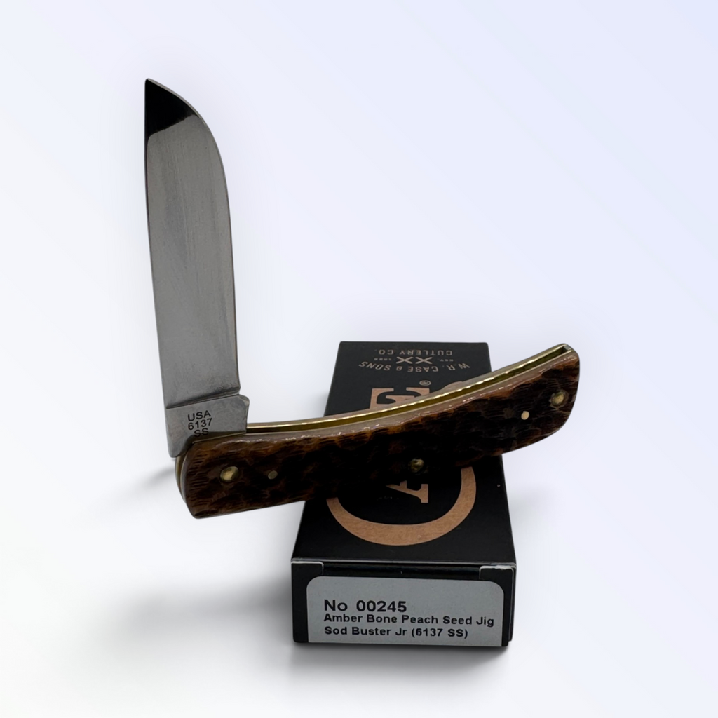 Pigeon Roost Knives Case XX Sod Buster Jr. pocket knife with amber bone peach seed jig handle and stainless steel blade