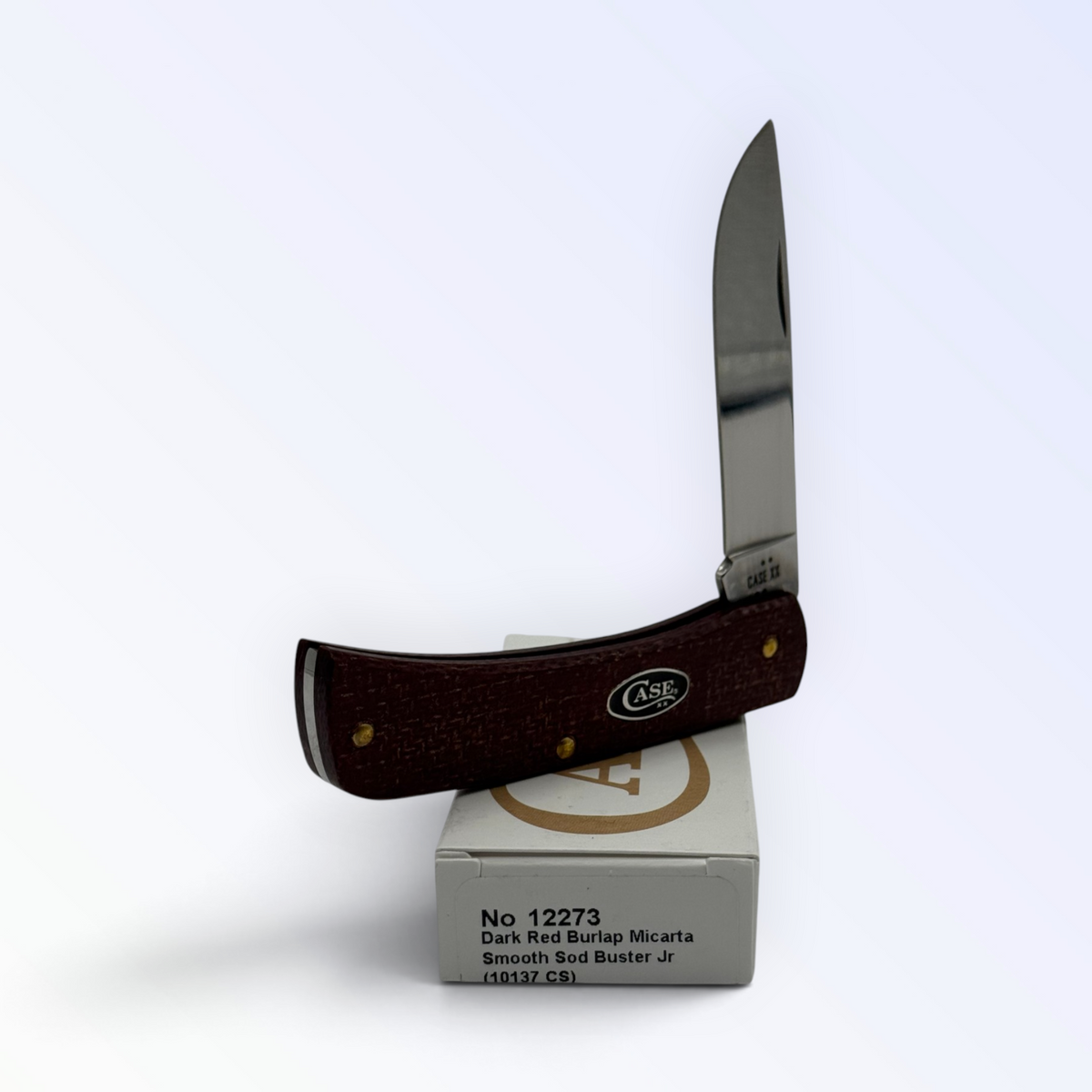 Sod Buster Jr by Case XX in dark red burlap Micarta (12273), three-quarter open shot showing handle and blades