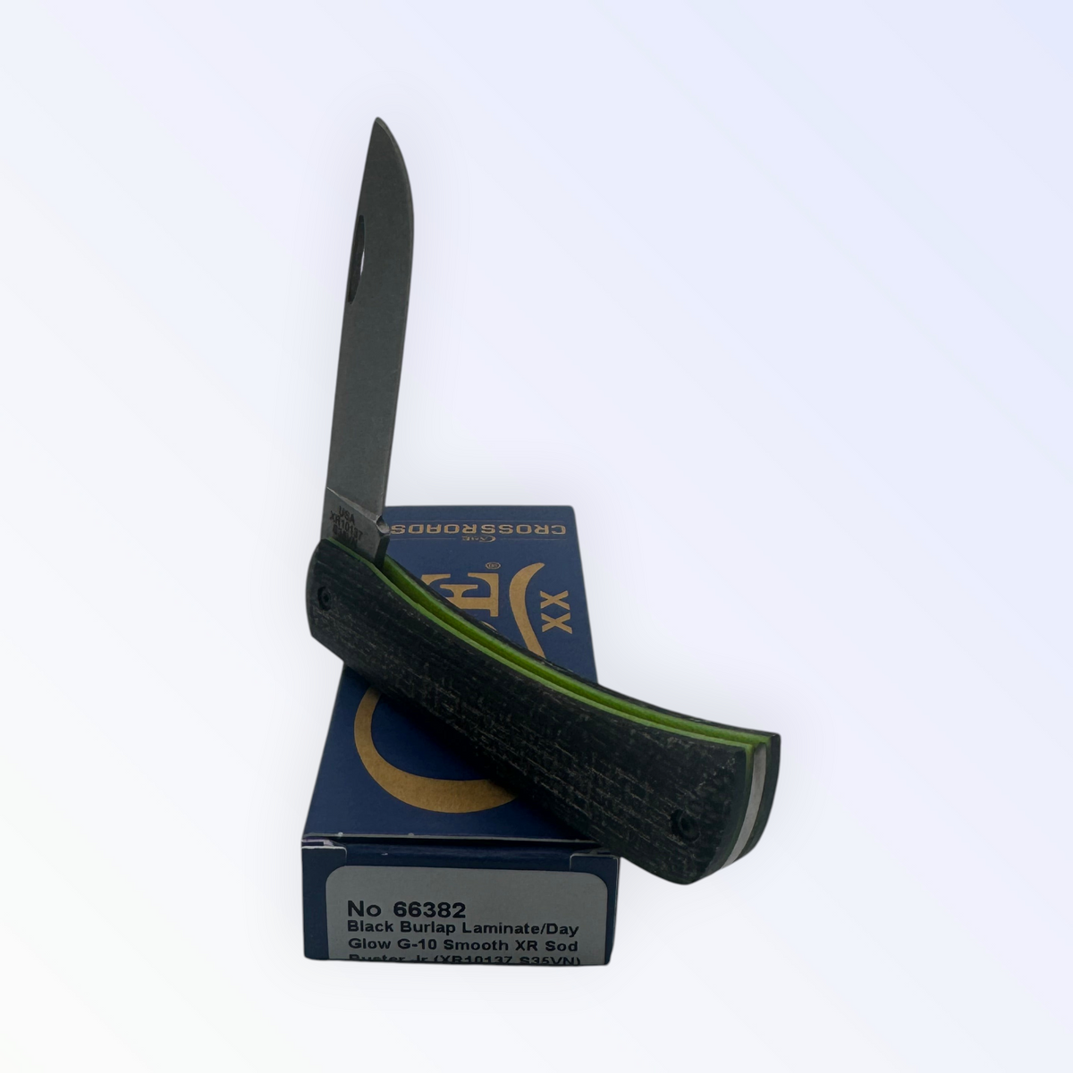 Pigeon Roost Knives Case XX Sod Buster Jr with black burlap laminate handle, day glow G-10 liners, and skinner blade.