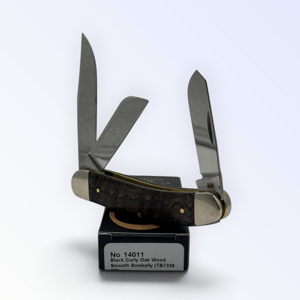 Case XX Sowbelly Stockman 14011: black curly oak wood, open on box with end label facing forward
