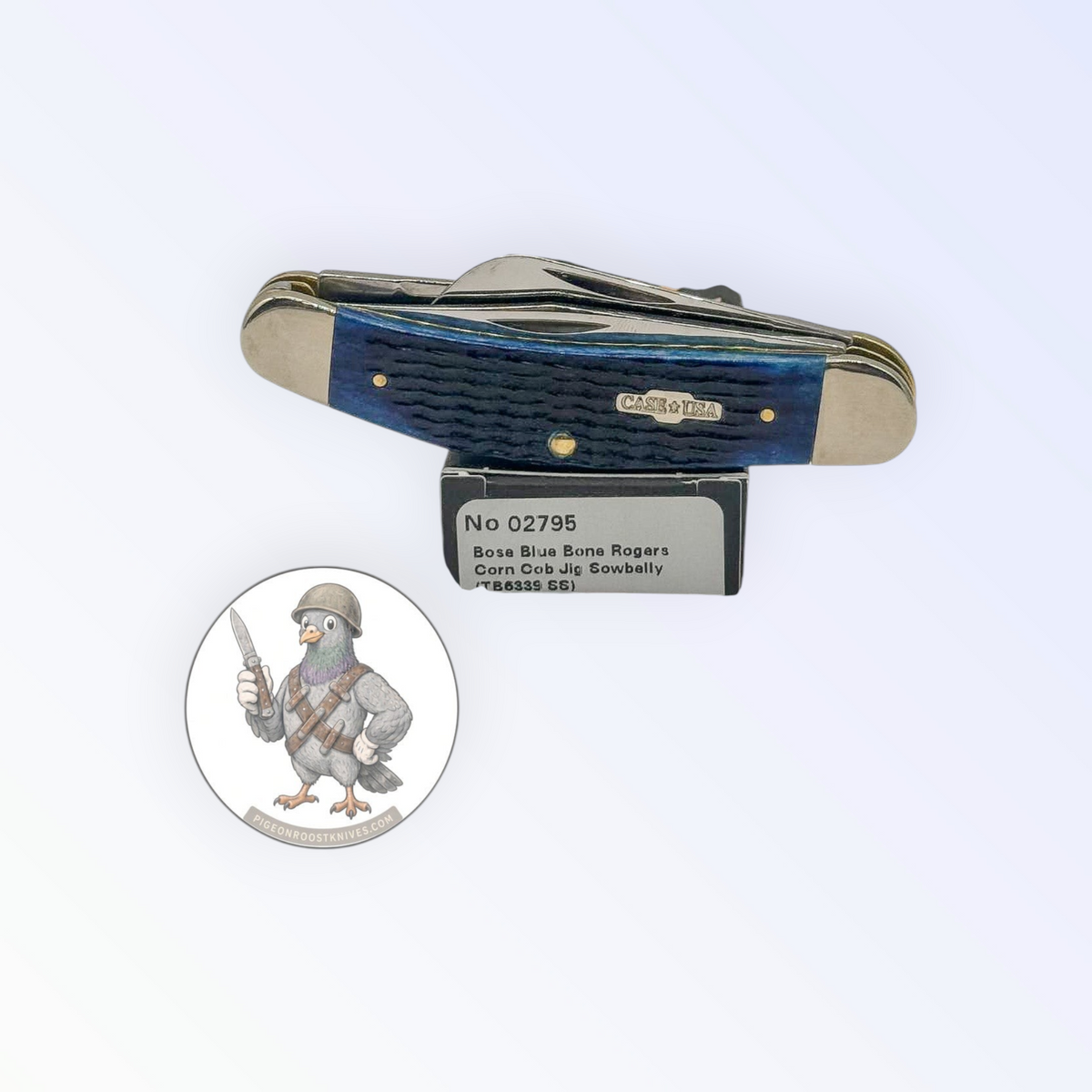 Sowbelly Stockman by Case XX in jigged navy blue bone (02795), open on box with end label facing forward