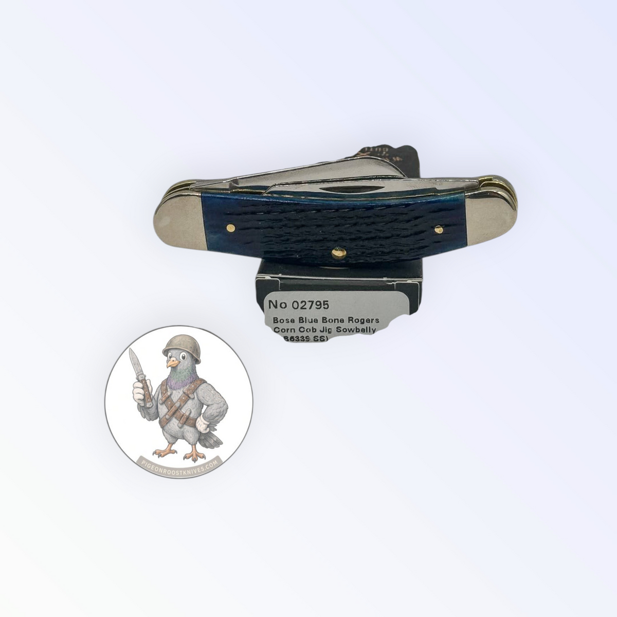 Case XX Sowbelly Stockman 02795: jigged navy blue bone, studio shot open atop the retail box