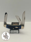 Case XX Sowbelly Stockman with jigged navy blue bone and three-blade stockman, SKU 02795 — blades open resting on the factory box