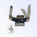 Case XX Sowbelly Stockman with jigged navy blue bone and three-blade stockman, SKU 02795 — blades open resting on the factory box