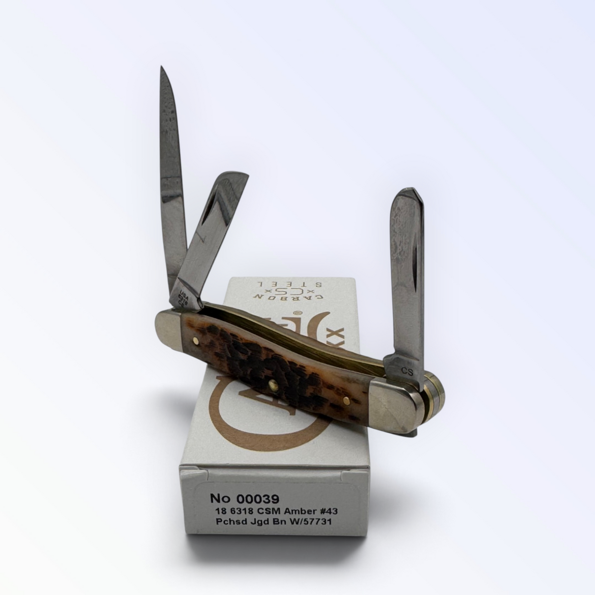 Pigeon Roost Knives Case XX Medium Stockman pocket knife with amber bone handle and three carbon steel blades