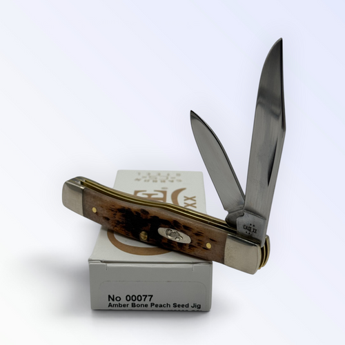 Pigeon Roost Knives Case XX Texas Jack pocket knife with amber peach seed jigged bone handle and two carbon steel blades
