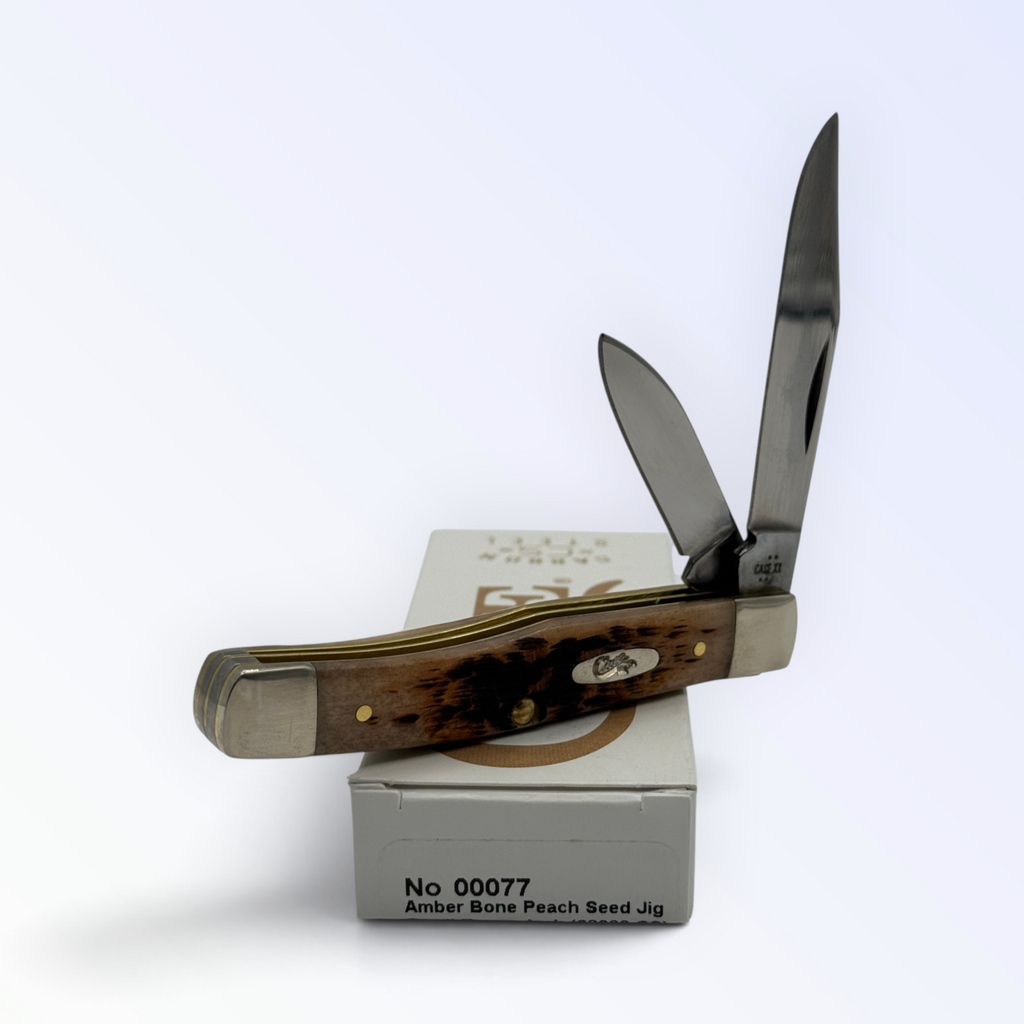 Pigeon Roost Knives Case XX Texas Jack pocket knife with amber peach seed jigged bone handle and two carbon steel blades