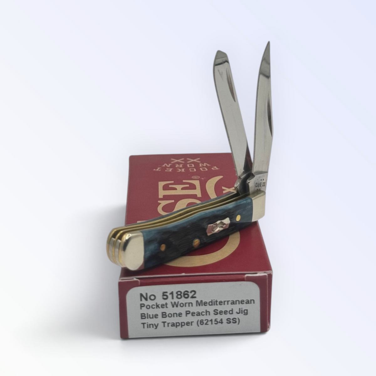 Case XX Tiny Trapper Pocket Worn Mediterranean Blue Bone, SKU 51862 — closed profile on the Case XX box