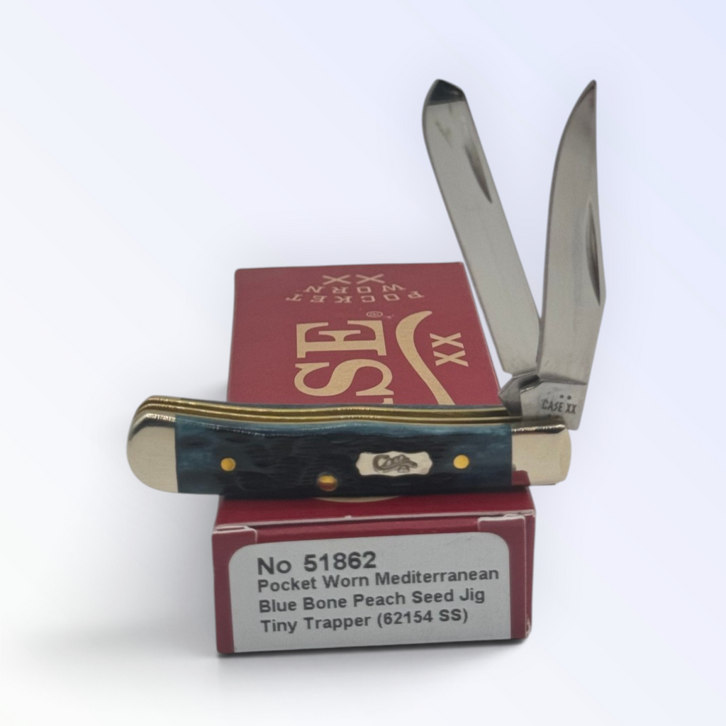 Case XX Tiny Trapper Pocket Worn Mediterranean Blue Bone with SKU 51862 — blades open resting on the factory box