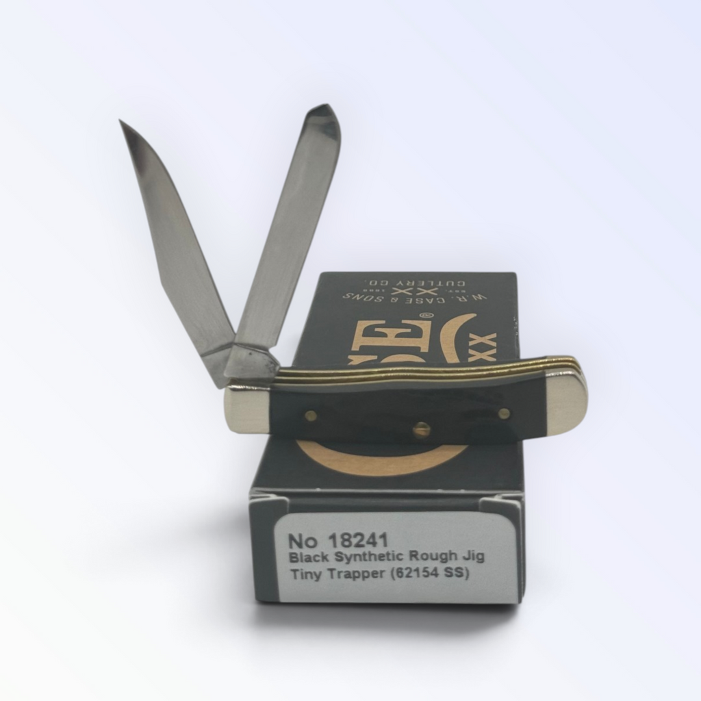 Tiny Trapper Rough Black Synthetic by Case XX (18241), close view of handle texture with blades open on box