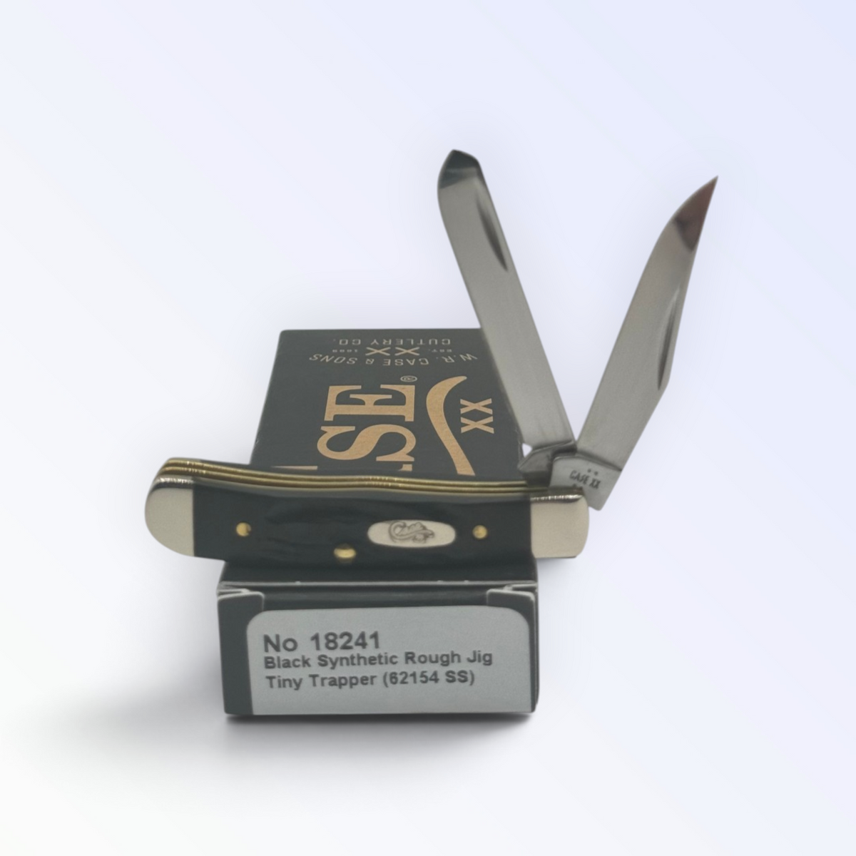 Case XX Tiny Trapper Rough Black Synthetic with SKU 18241 — blades open resting on the factory box